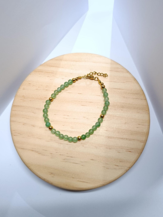 Bracelet en pierres naturelles d'aventurine et acier inoxydable doré