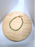 Bracelet en pierres naturelles d'aventurine et acier inoxydable doré