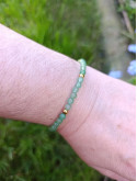 Bracelet en pierres naturelles d'aventurine et acier inoxydable doré