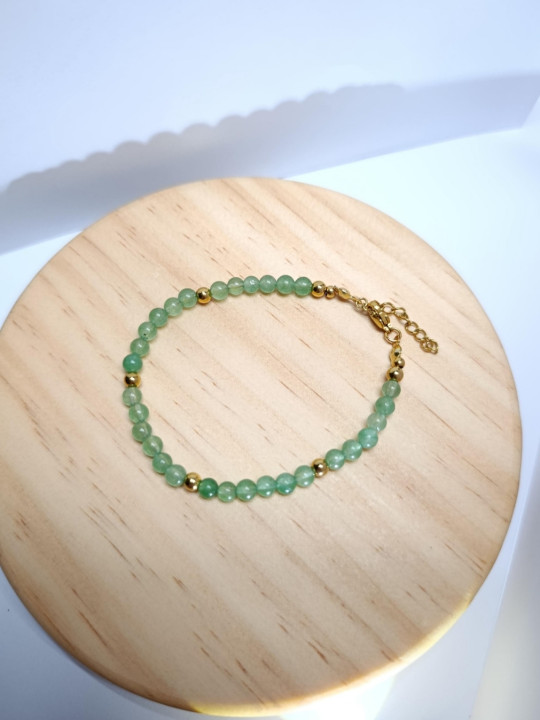 Bracelet en pierres naturelles d'aventurine et acier inoxydable doré