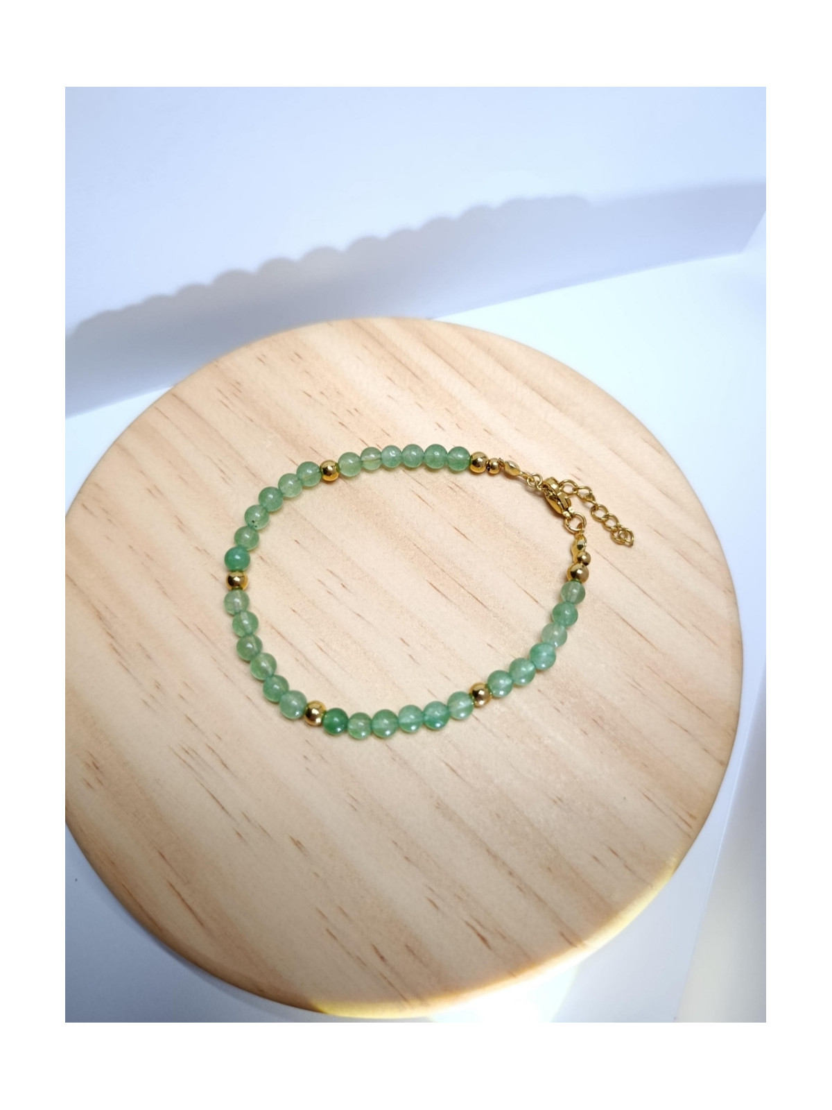 Bracelet en pierres naturelles d'aventurine et acier inoxydable doré