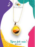 Collier artisanal en laiton et sa perle de tableau coucher de soleil
