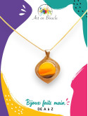 Collier artisanal en laiton et sa perle de tableau coucher de soleil
