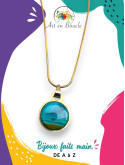 Collier rond artisanal en laiton et sa perle de tableau bleu vert