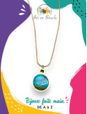 Collier rond artisanal en laiton et sa perle de tableau bleu vert