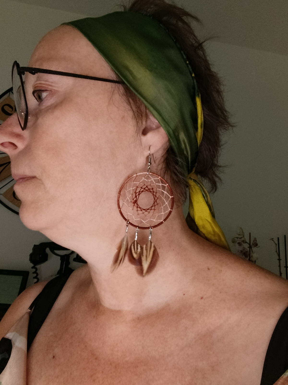 Boucle d'oreilles attrape-rêve en plumes naturelles