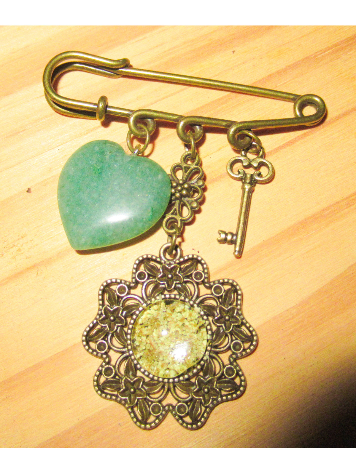 Broche clé protection et abondance